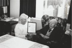 Presentation to Leslie Smith to mark 70 years as amember of DNS. Made by Pip Seccombe (President) on 24th Feb 1996