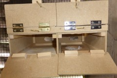 New boxes showing entrance holes between the church window louvres