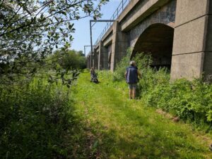 Footpath runs alongside railway viaduct